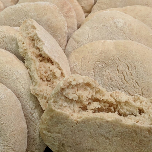 Proper Pitas (bag of 5) available on the first HUB of every month - warm thick fluffy delicious organic filling pitas.